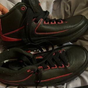 Blacks and red kid shoes